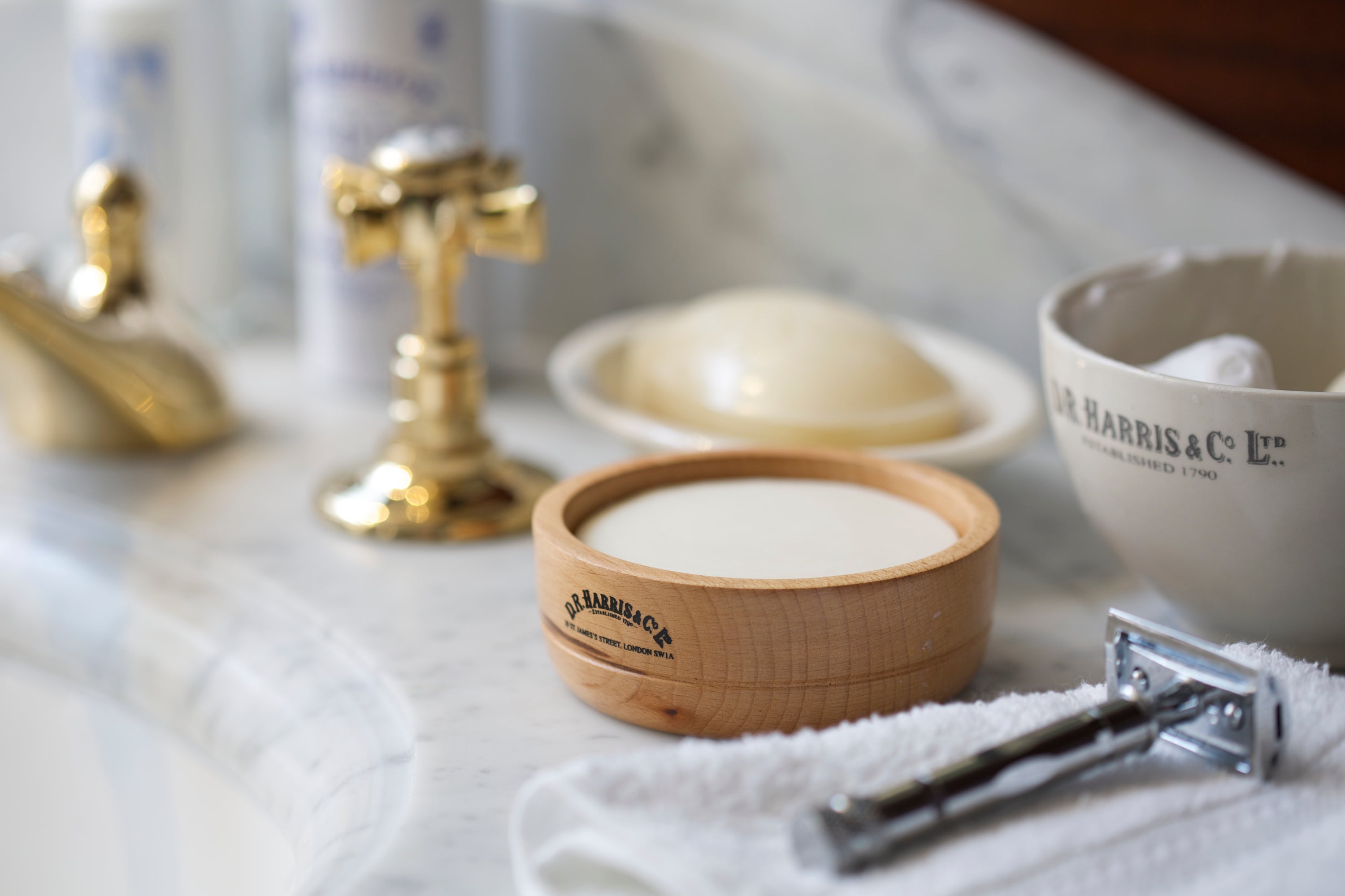 shaving products displayed on a marble counter