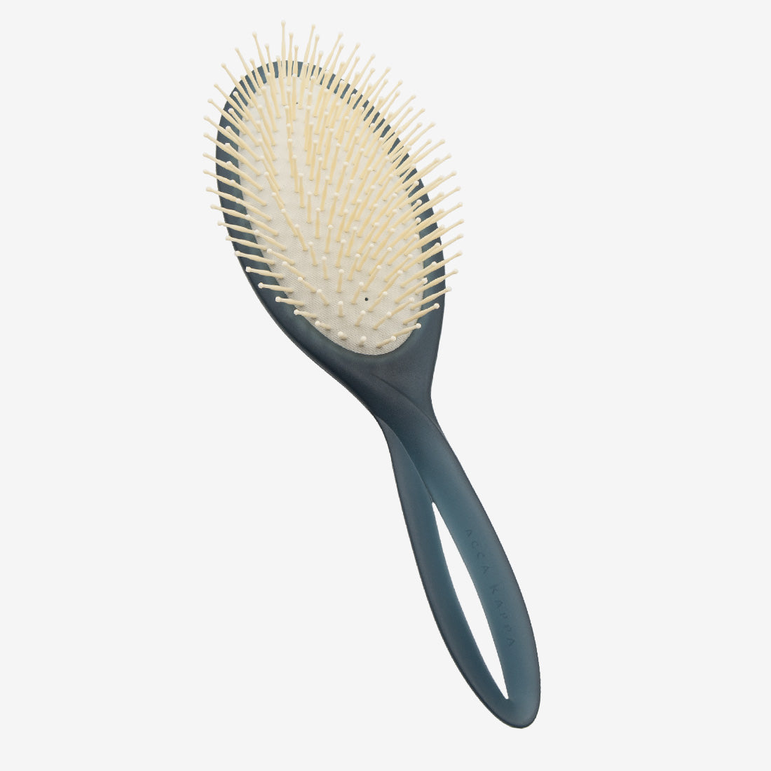 Hairbrush with a black handle and beige bristles on a white background