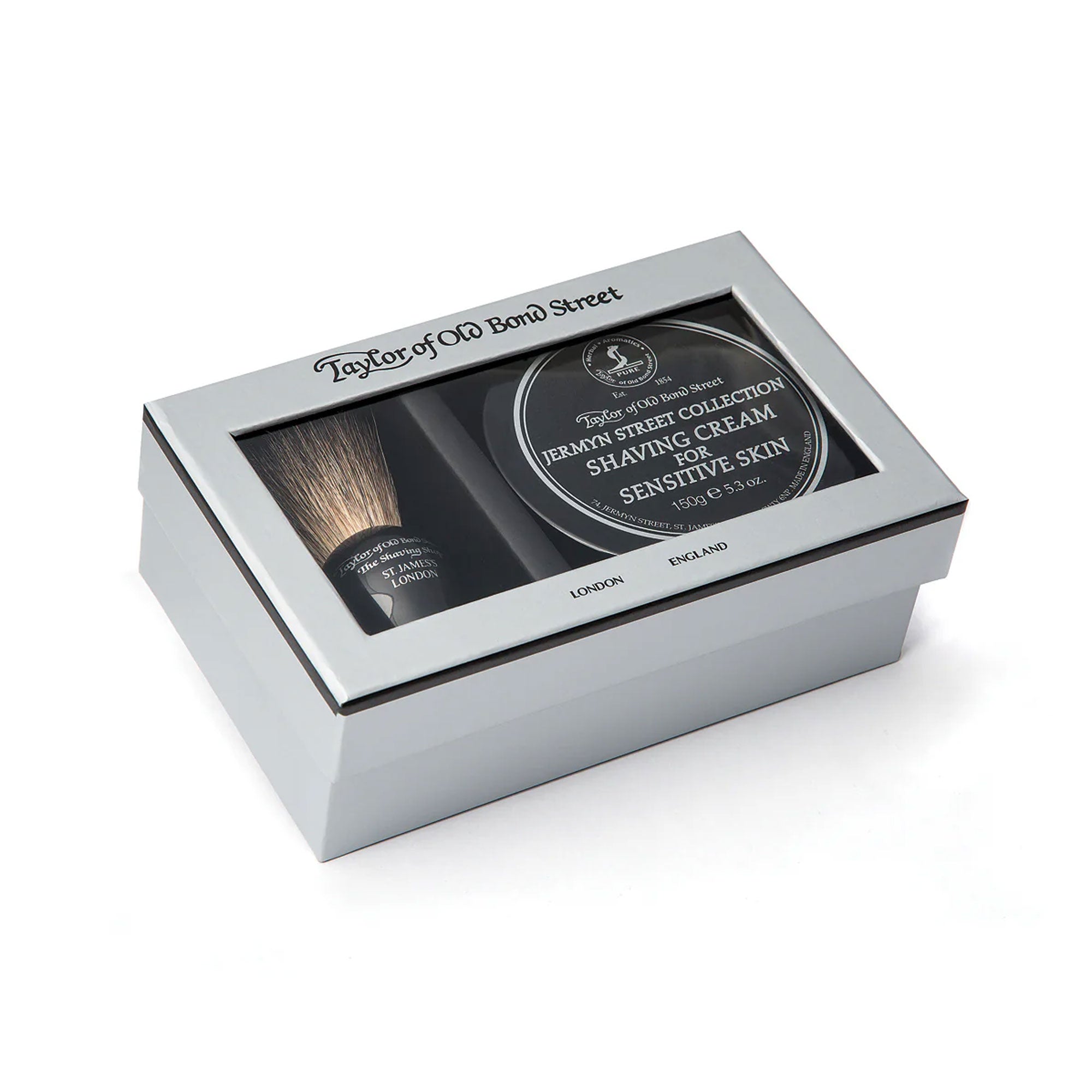 Taylor of Old Bond Street shaving set with brush and cream in a silver box on a white background