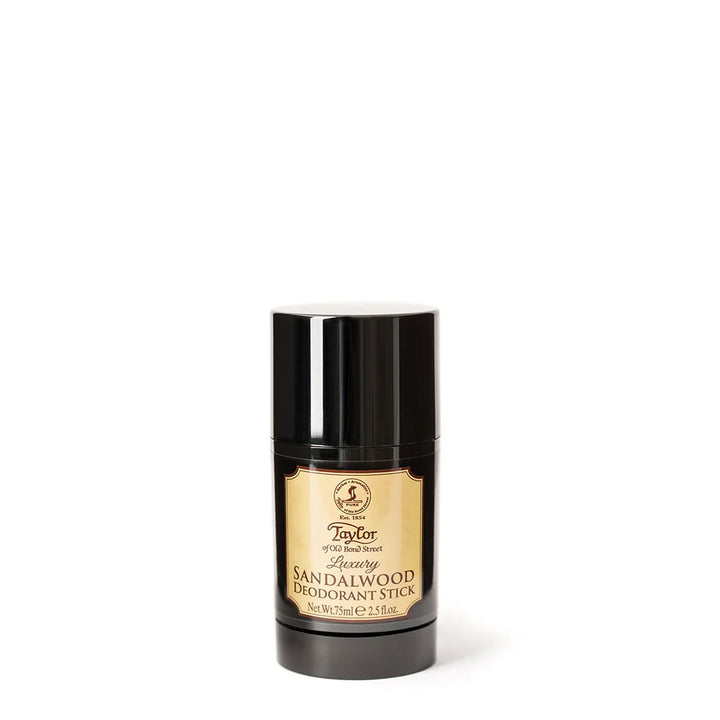 Black and gold deodorant stick on a white background