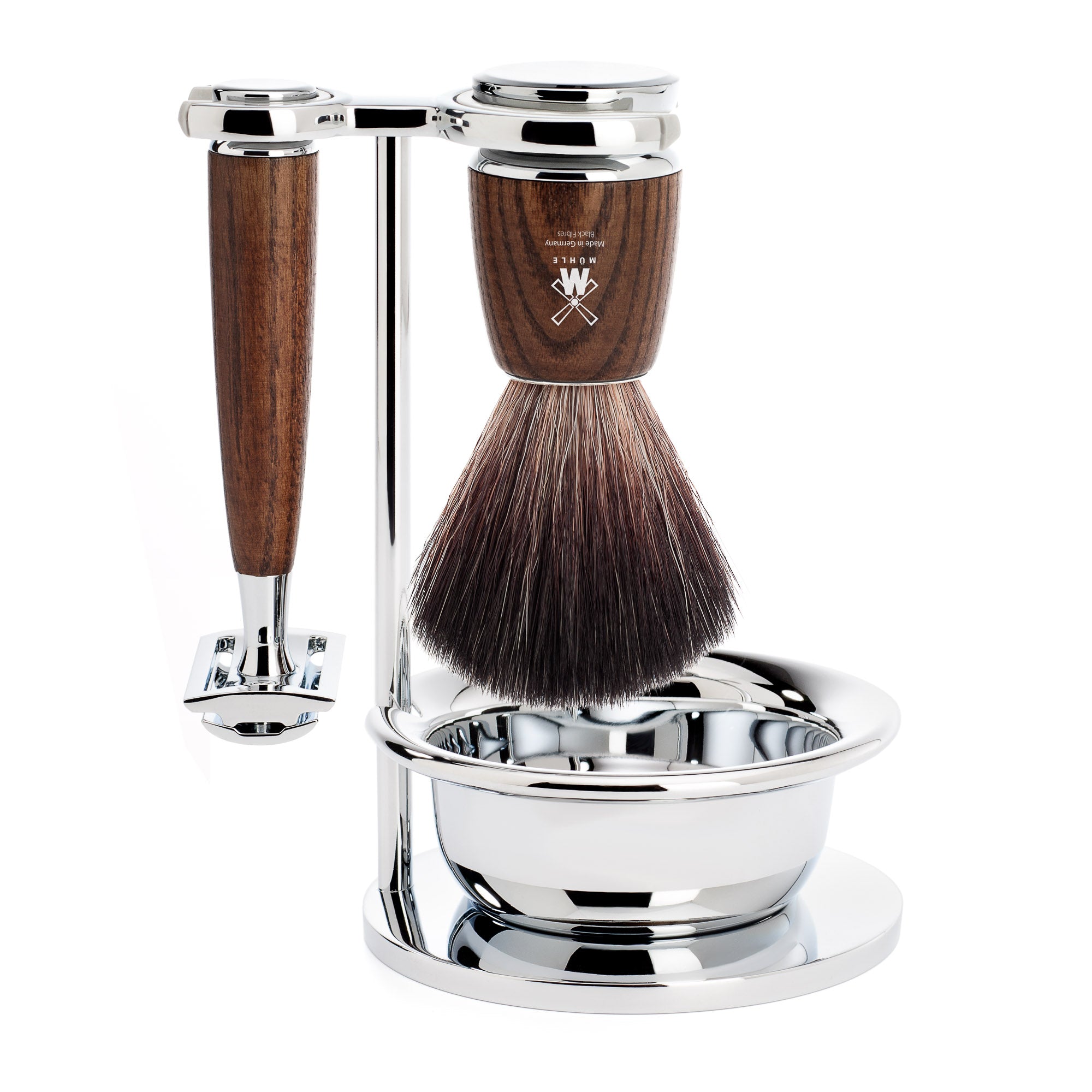 Shaving brush & safety razor with wooden handle and silver stand on a white background