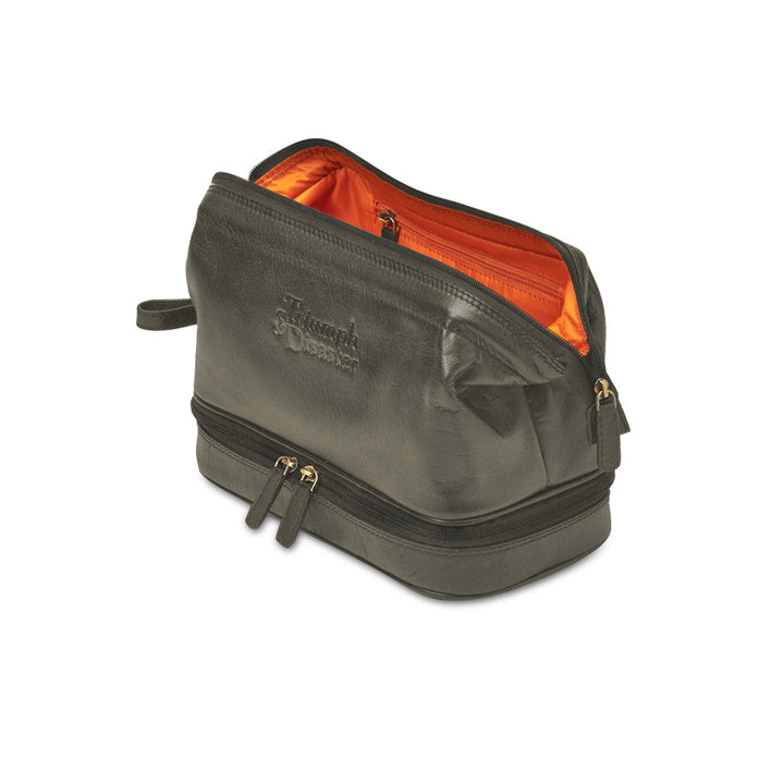 Green toiletry bag with orange interior on a white background