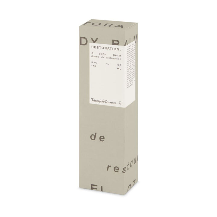 Box of Restoration Body Balm on a white background