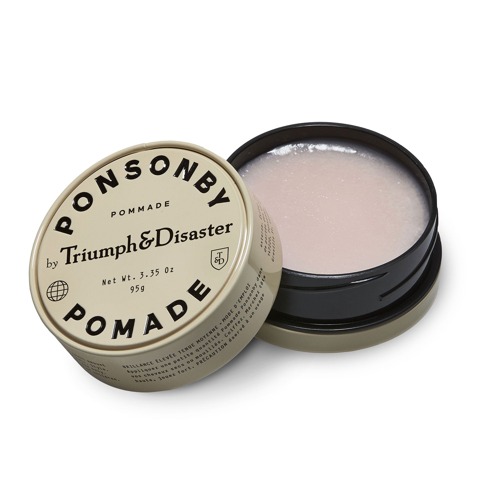 Pomade container with open lid showing pomade on a white background