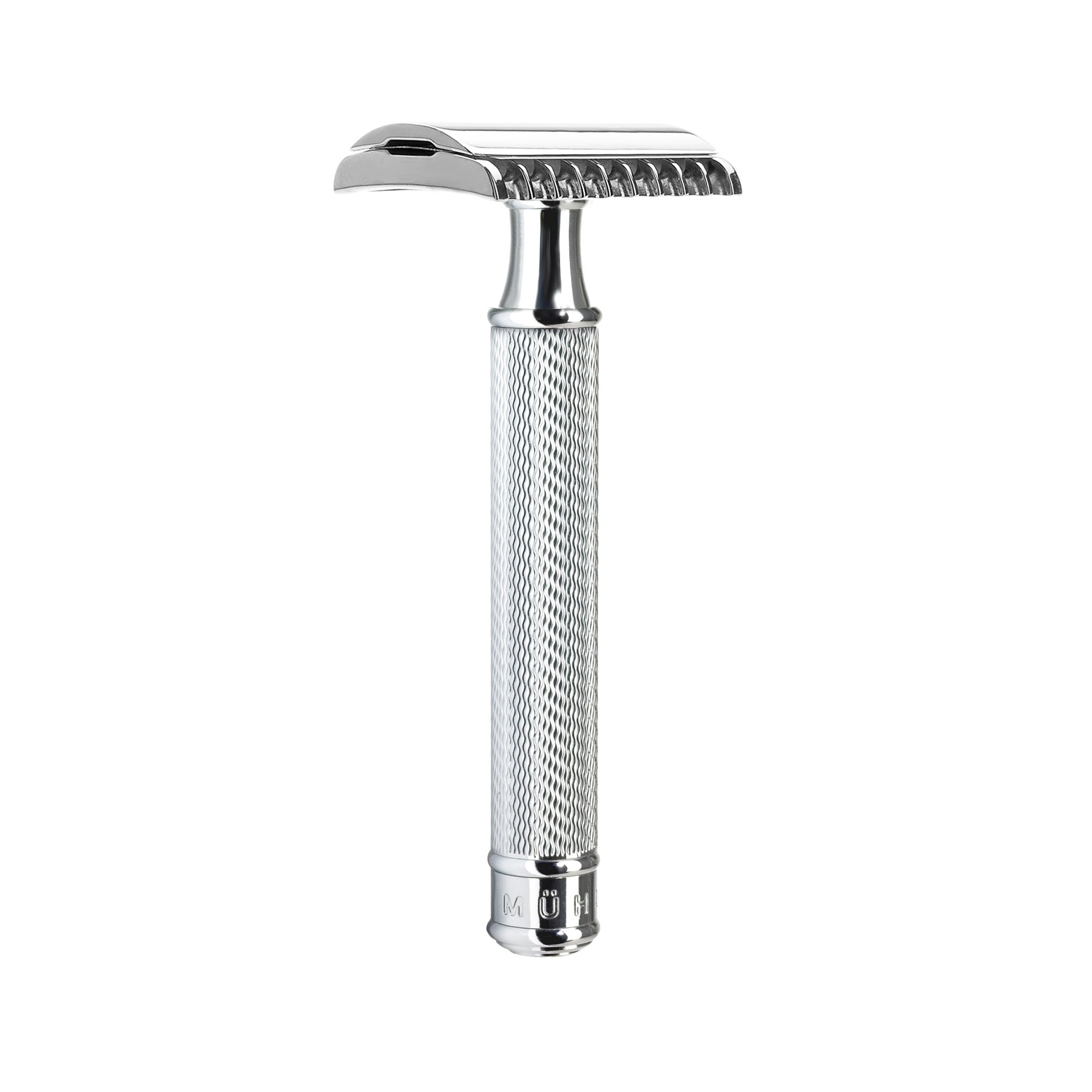 Silver safety razor on a white background