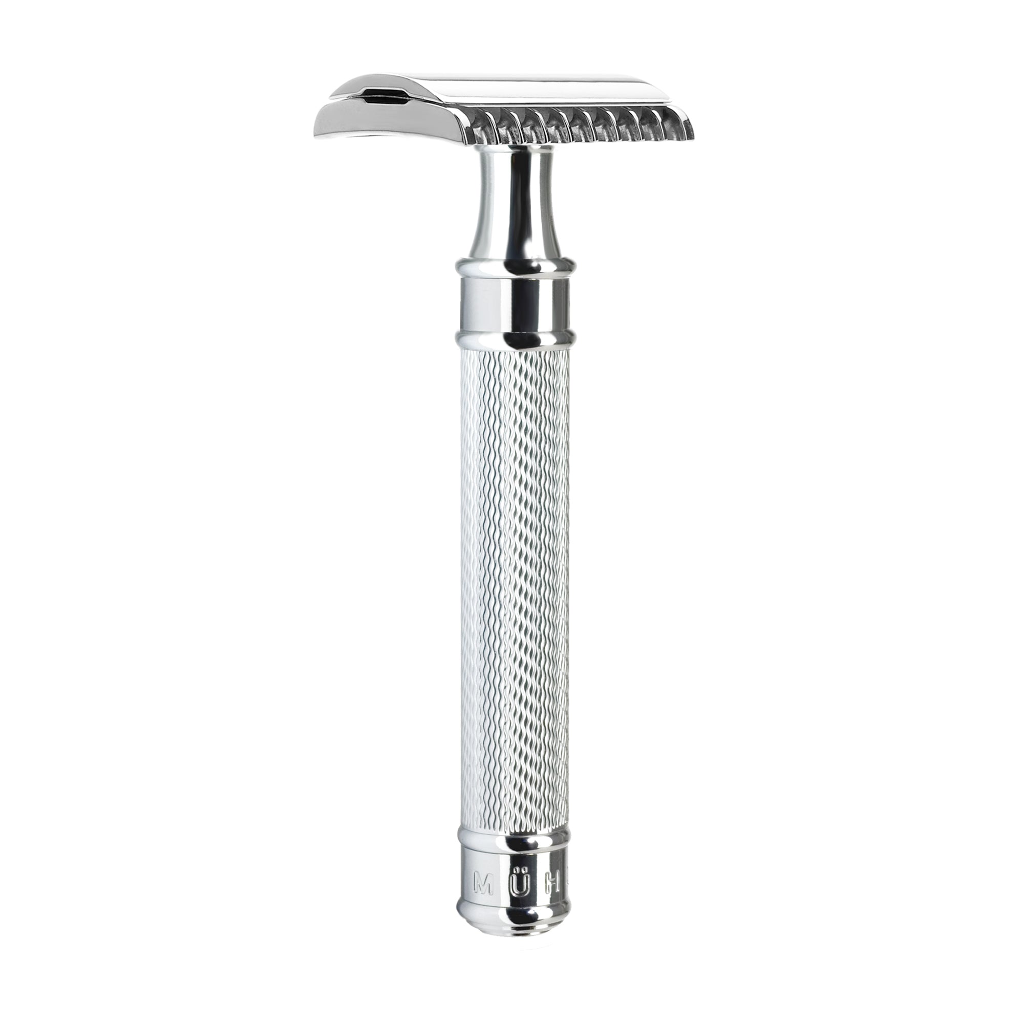 Silver safety razor on a white background