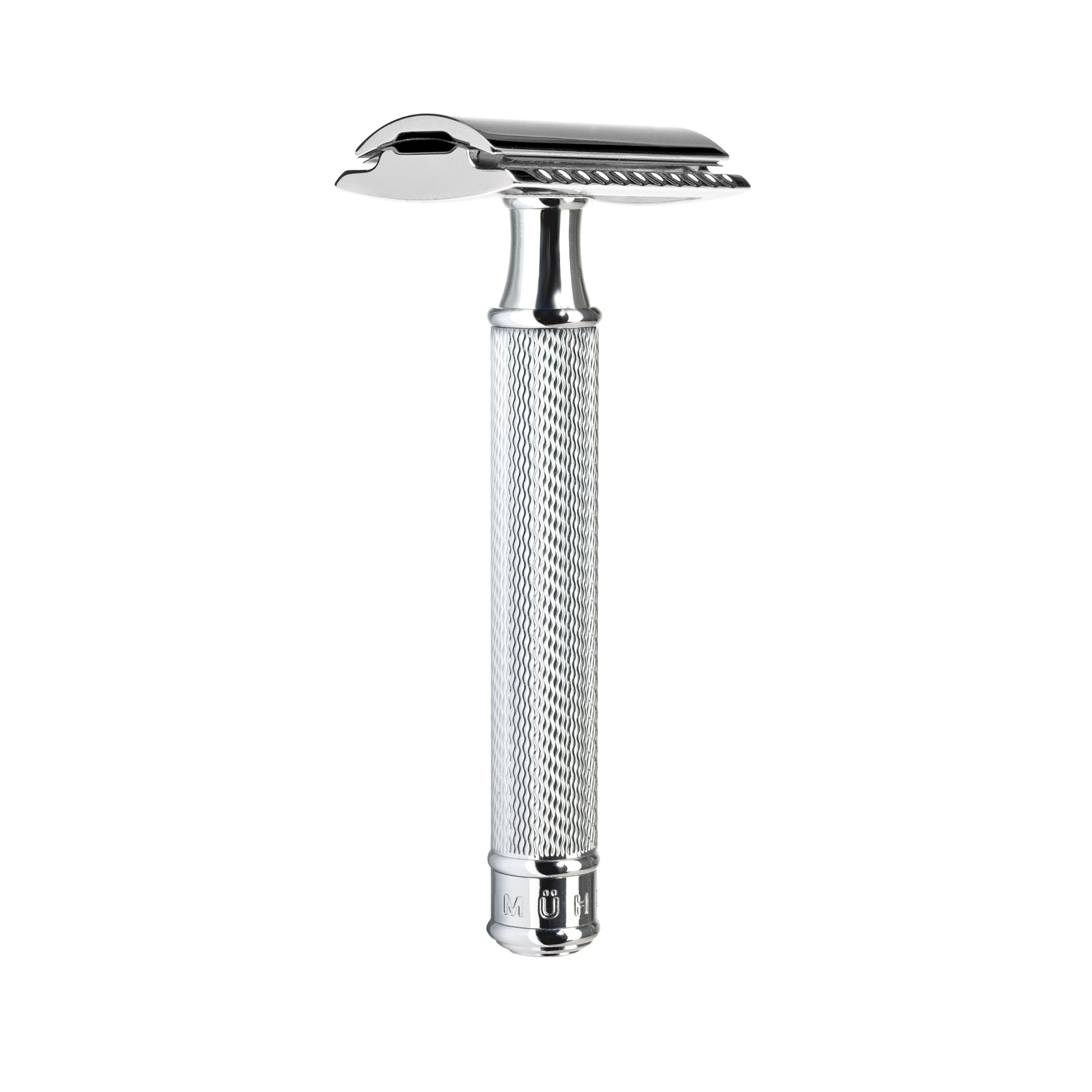 Silver safety razor on a white background