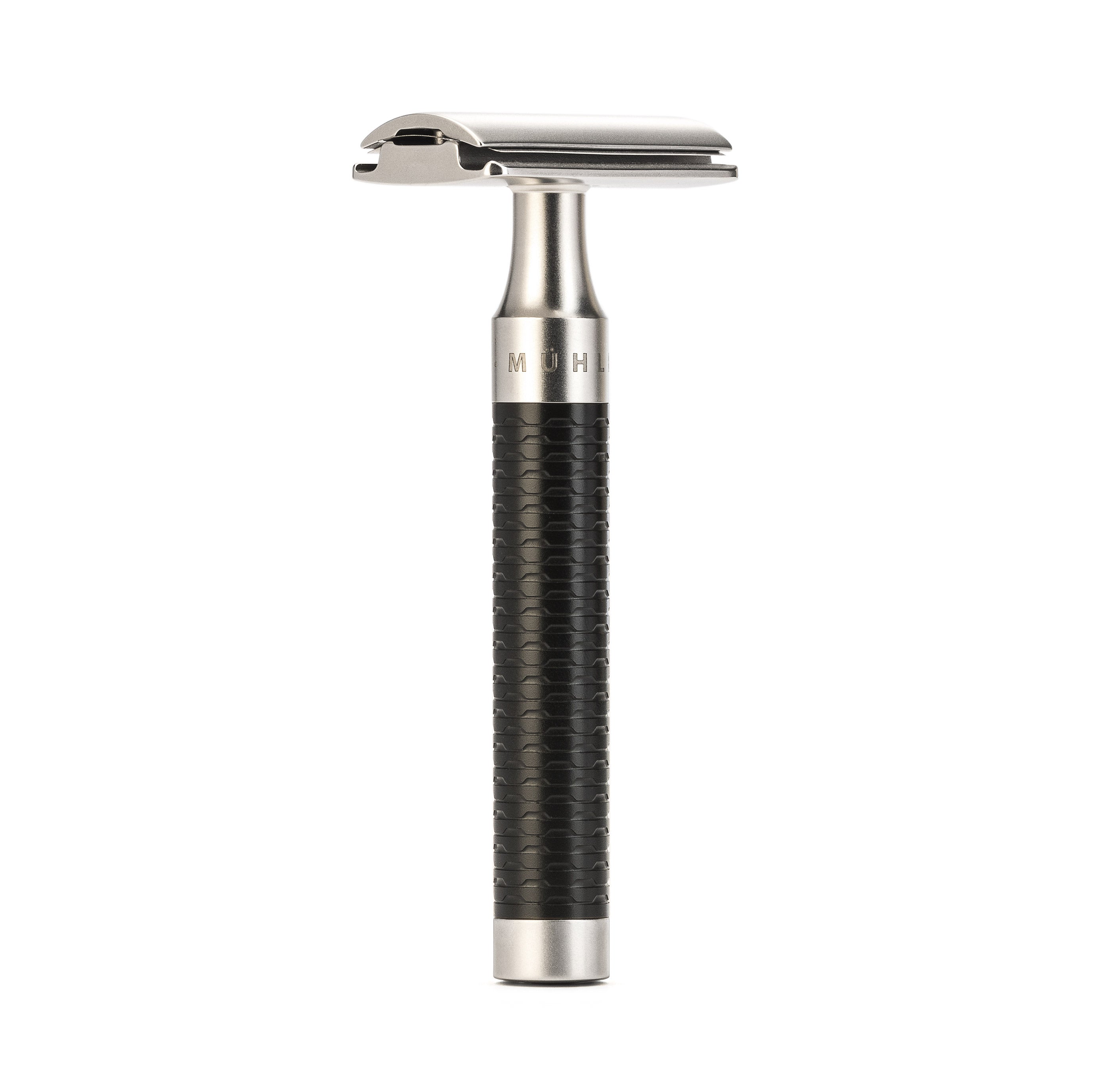 Shaving razor with black handle and silver accents on a white background