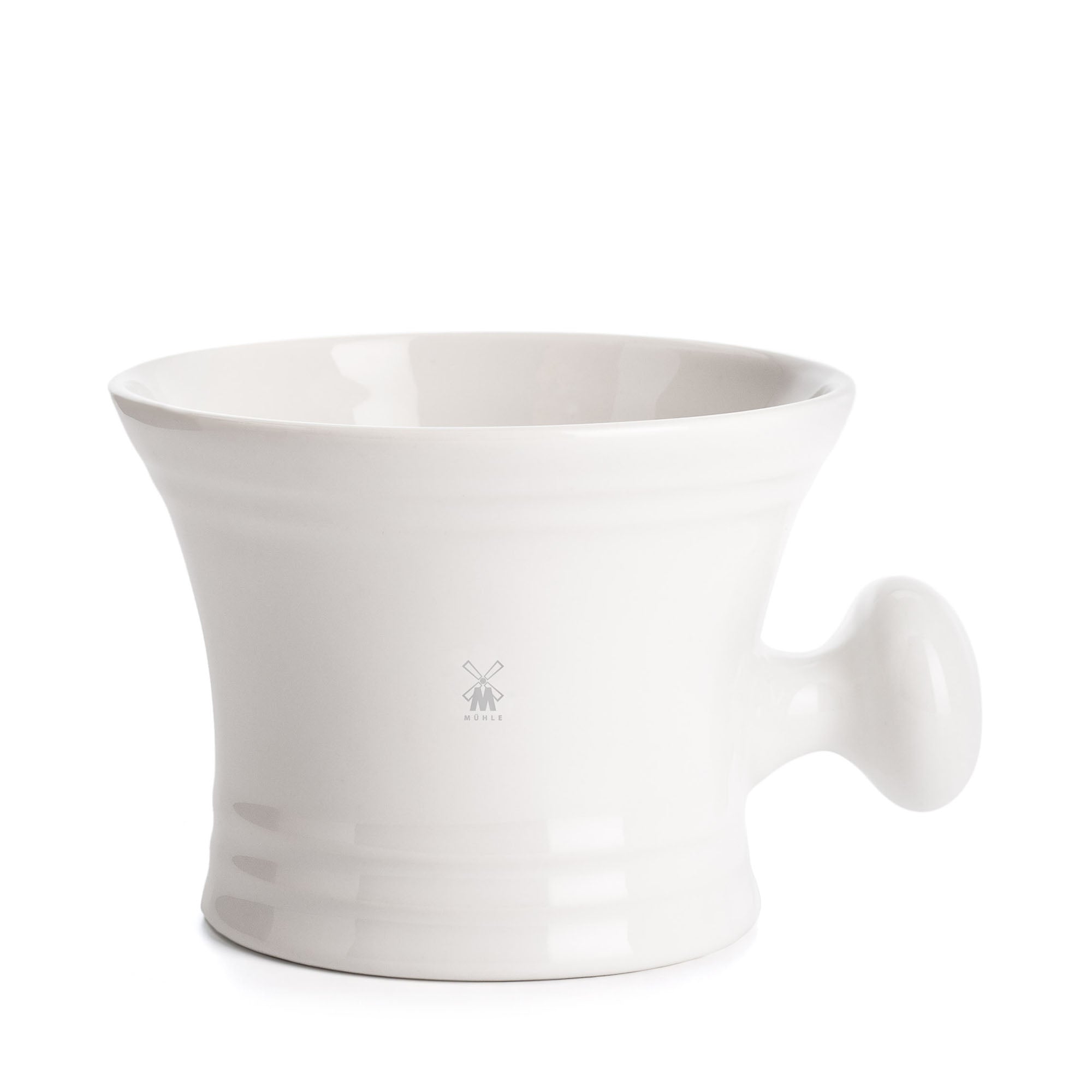 White ceramic cup with a unique handle design on a white background