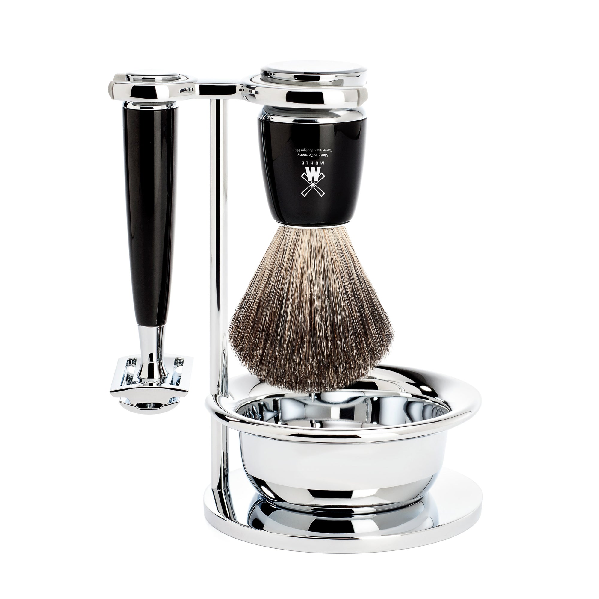 Shaving brush and razor with stand and bowl on a white background